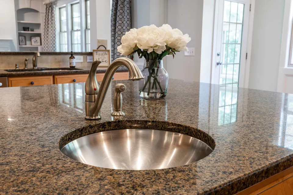 Steel sink on a granite worktop