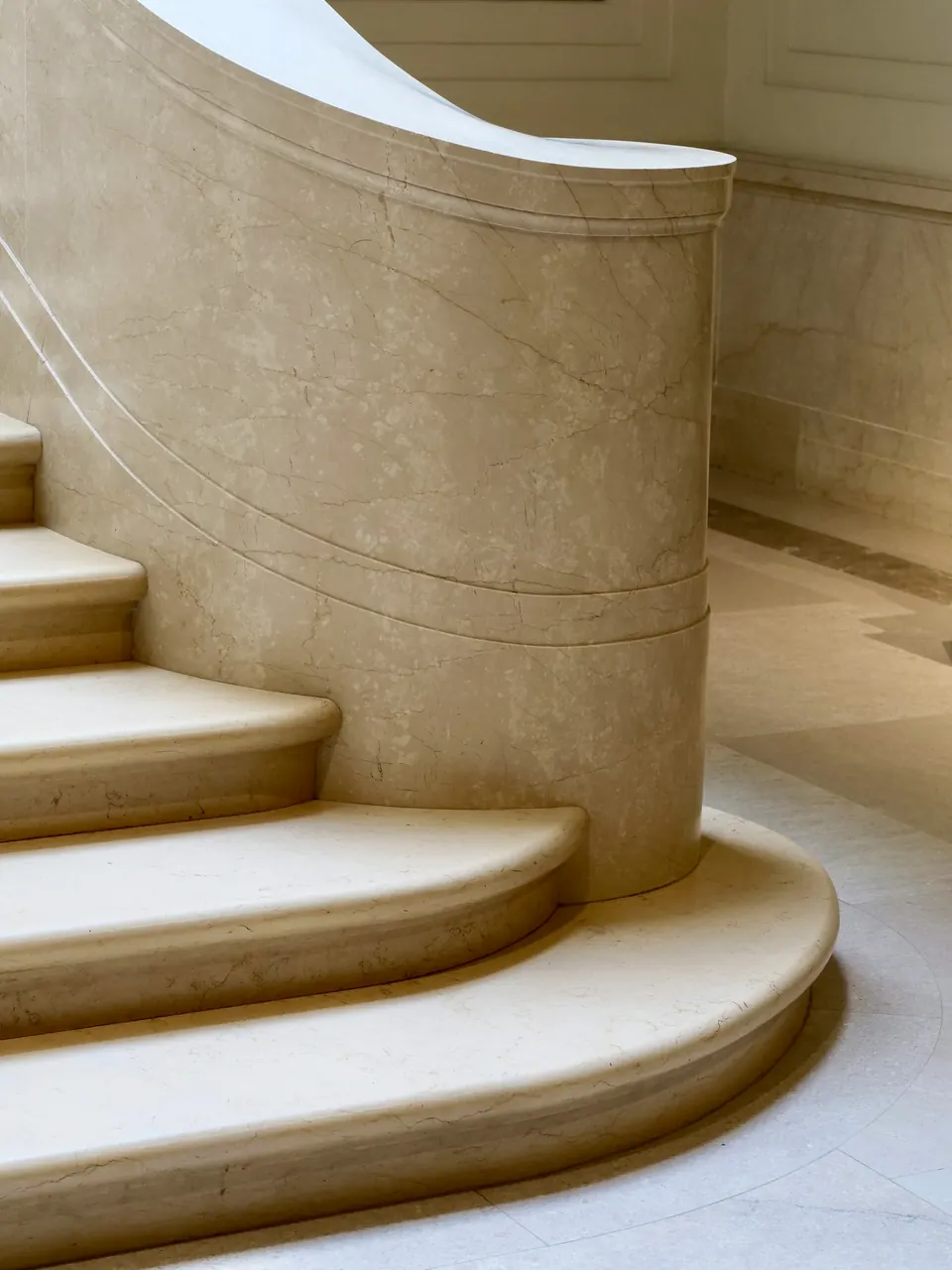 Curved marble staircase